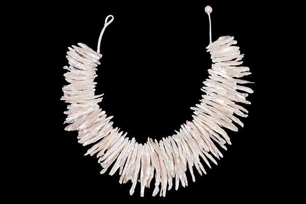 A Necklace With Two Overlapping Strands Of White Freshwater Pearls Long Narrow Graduated Drops