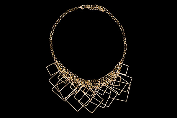 A Golden Metal Chain Links Necklace With Seventeen Diamond Shaped Bar Pendants