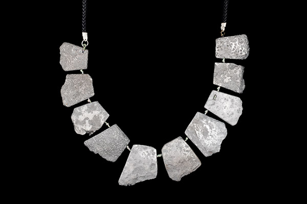 A Knotted Necklace Of Ten Large Silver Electroplated Magnesite Irregular Shaped Drops