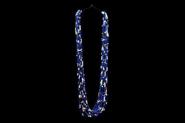 A Baule Long Necklace With Twenty Patterned Strands Of Blue, White, And Multicoloured Glass beads