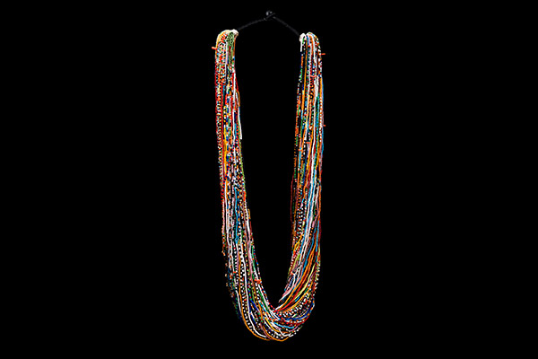 A Baule Long Necklace Of One Hundred And Thirty-Two Strands Of Small Multicoloured Glass Beads