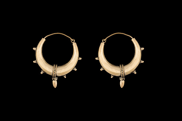 A Pair Of Large Golden Metal Tapered Tube Hoop Earrings Each With Ten Knobs And An Oval Pendant