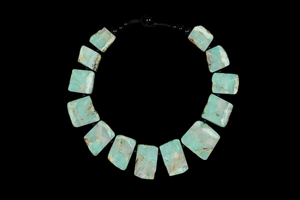 A Necklace Of Brazilian Chrysoprase Graduated Flat Rectangular Drops With Black Onyx Round Spacers