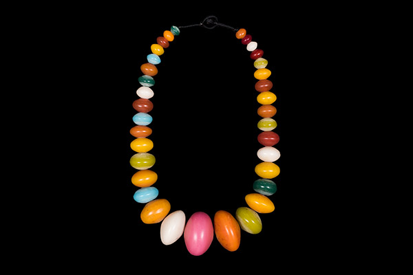 A Long Necklace Of Thirty-Five West African Graduated Multicoloured Resin Button Beads