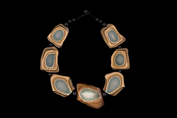 A Necklace Of Seven Grey And Brown Natural Patterned Banded Agate Irregular Shaped Slices