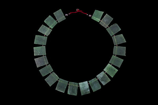 A Necklace Of Twenty Canadian Jade Flat Rectangular Drops With Garnet Round Spacers