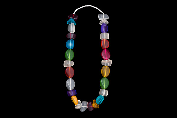 A Long Necklace Of Twenty-Six Javanese Large Multicoloured Resin Beads Of Different Shapes And Sizes