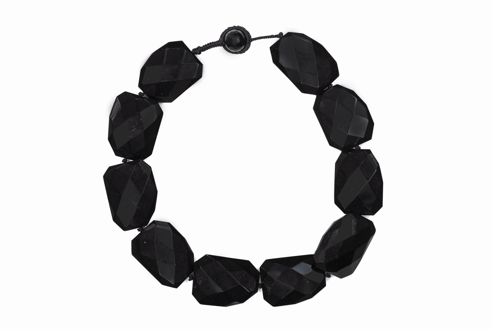 A Knotted Necklace Of Ten Black Onyx Large Rectangular Facetted Beads.