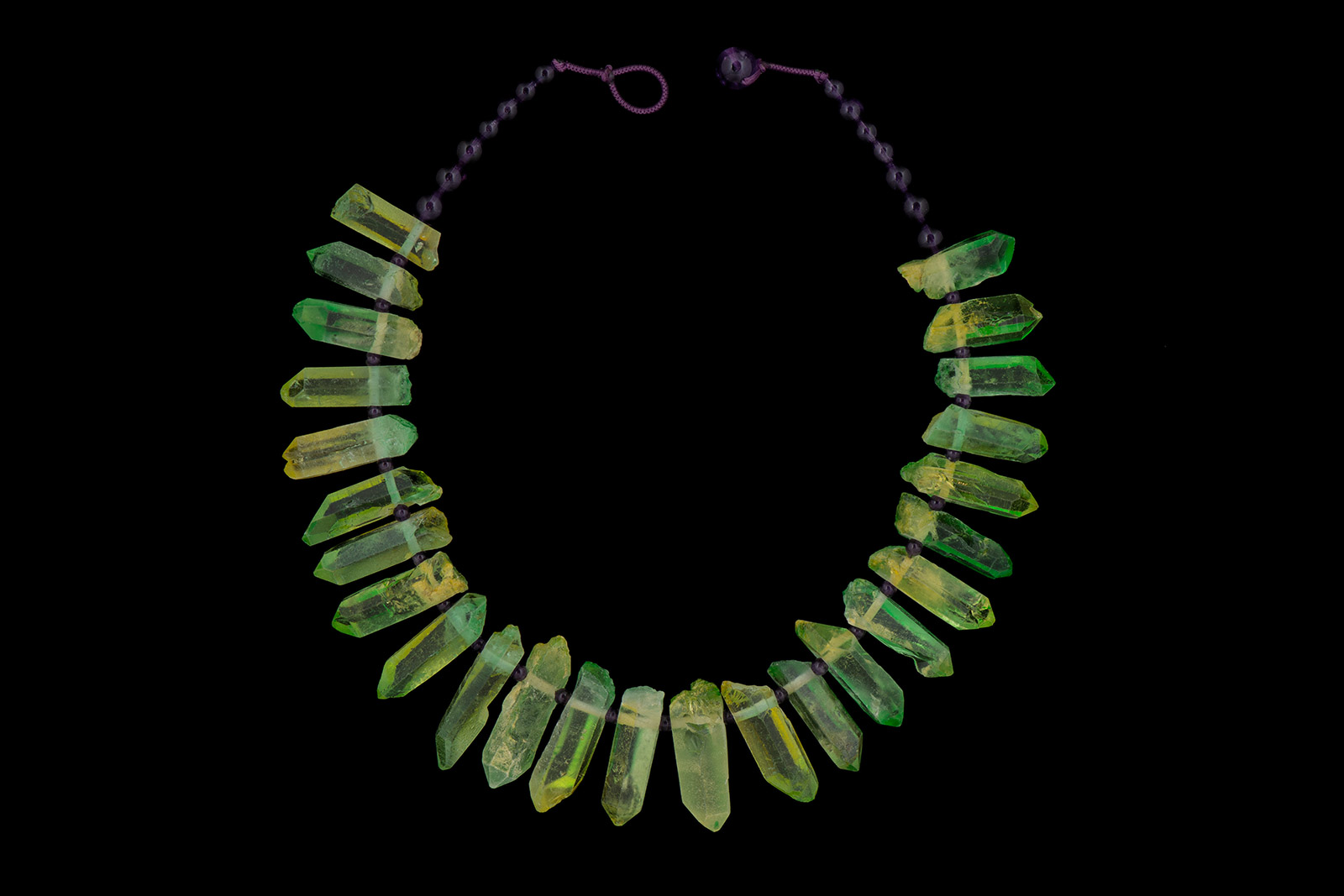 A Necklace Of Light Green Dyed Facetted Rock Crystal Graduated Drops, With Amethyst Round Spacers And Beads.