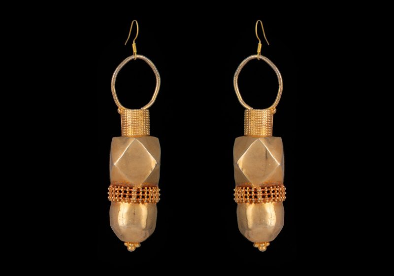 A Pair Of Indian Gold Plated Large And Long Hollow Patterned Drop Earrings, Suspended From Gold Plated Wire Hooks.