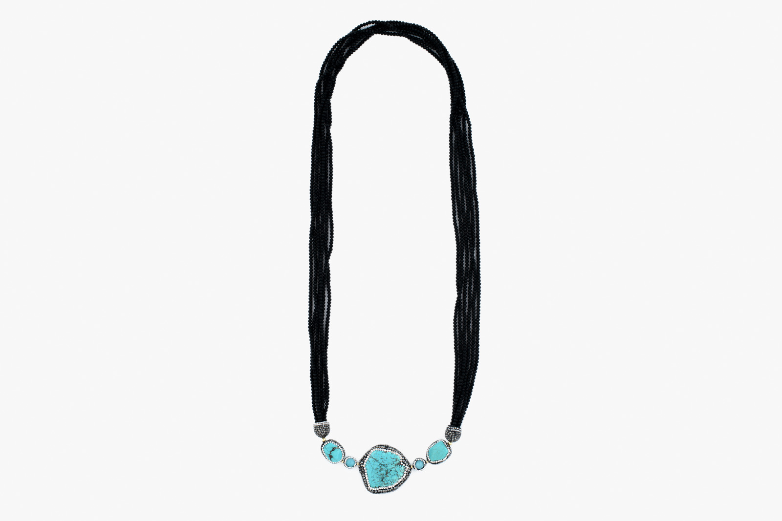 A Long Six Strand Necklace Of Small Facetted Black Glass Beads Wit6h Five, Mixed Shaped And Sized Turquoise Beads, Each With Borders Of Small Facetted Glass Beads And Small Facetted Marcasites.