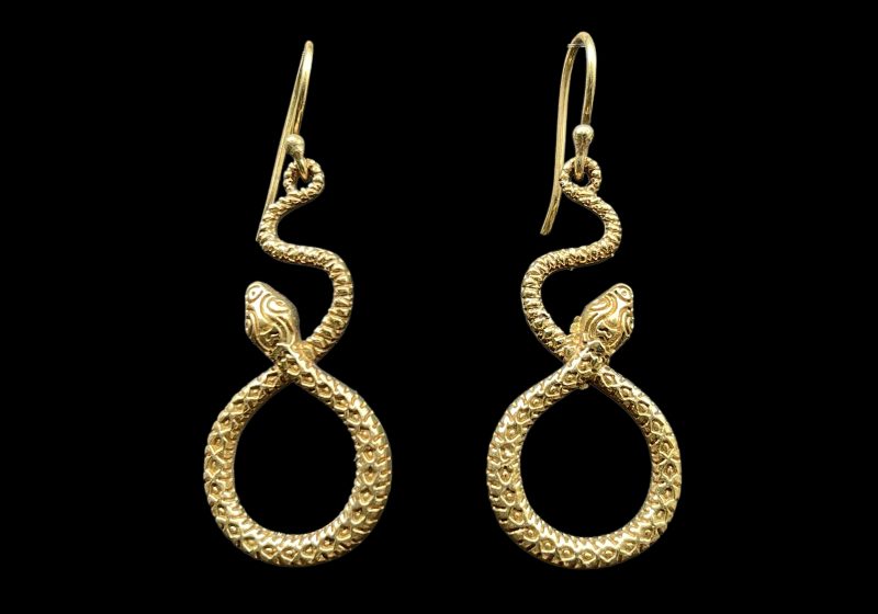 A Pair Of Balinese Brass Earrings With Coiled Teardrop Shaped Snakes On Long Brass Wire Hooks