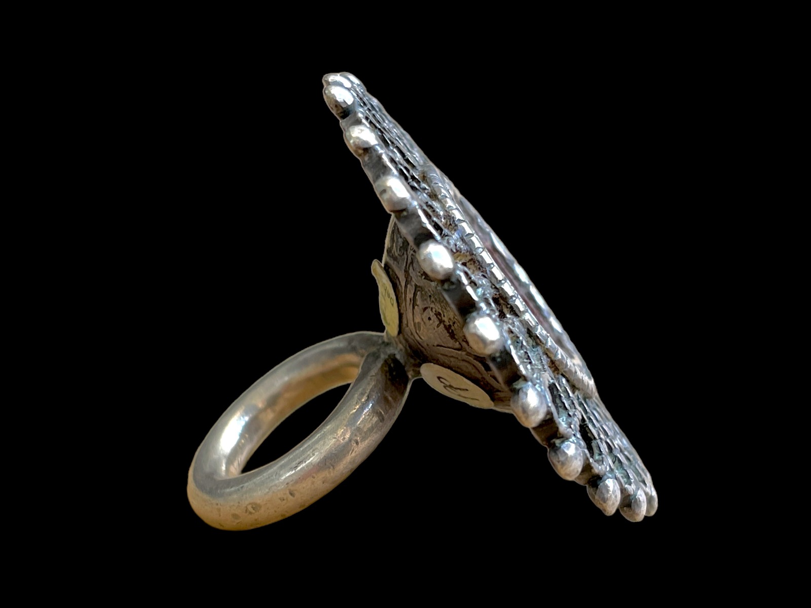 An Afghan Old Traditional Large Silver Ring With A Circular, Floral Patterned Filigree Top, Inlaid With A Red Glass Circular Centre. - Image 3