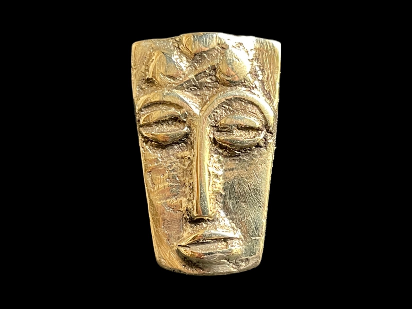 A Baule Adjustable Open Band Brass Ring With A Rectangular Face Patterned Panel Top. Ivory Coast, West Africa.