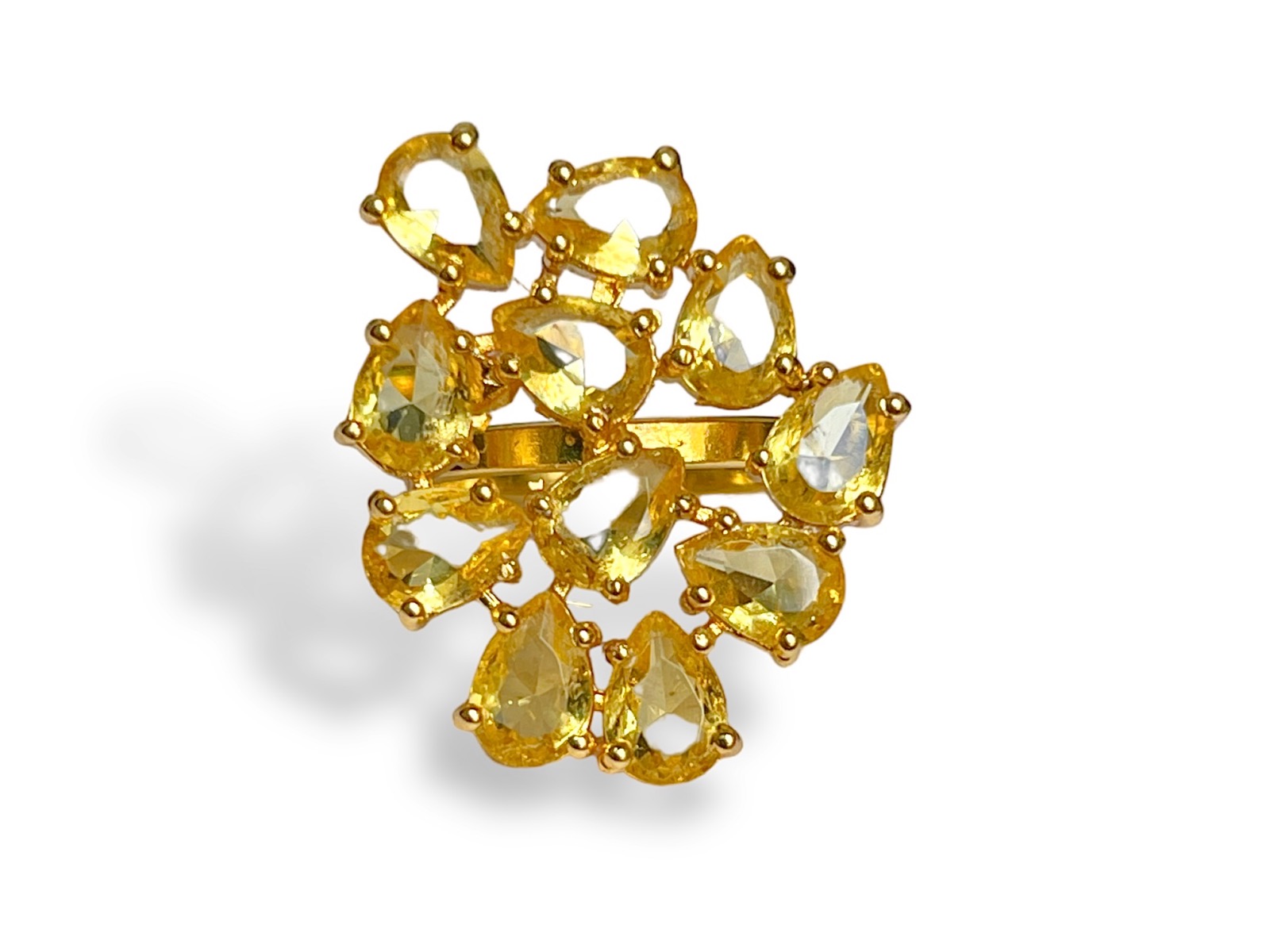 A Gold Plated Adjustable Band Ring Decorated With Eleven Yellow Facetted Glass Teardrops.