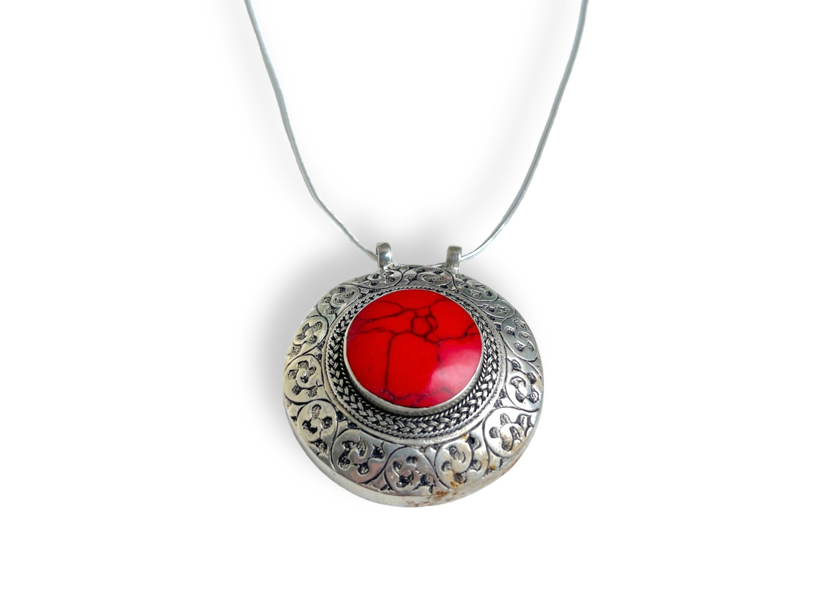 An Afghan Circular Silver Plated Patterned Pendant With A Red Dyed Howlite Circular Panel Centre. - Image 3