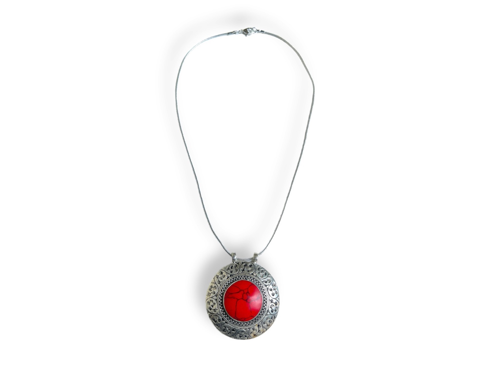 An Afghan Circular Silver Plated Patterned Pendant With A Red Dyed Howlite Circular Panel Centre. - Image 2