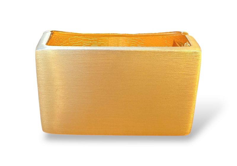 A Matt Golden Metal Hinged Bangle With Flat Rectangular Panels At The Front And Sides And A Curved Panel At the Back.