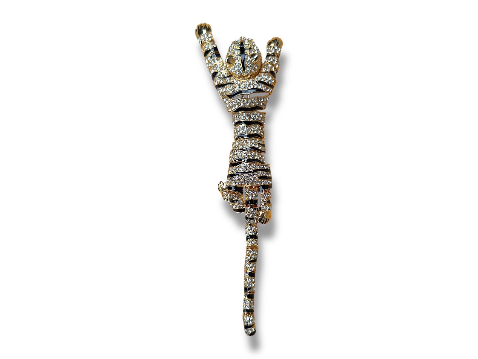 A Golden Metal Long Brooch Of A Leopard, With Linked Panels, Each Inlaid With Small Clear Facetted Glass Beads.