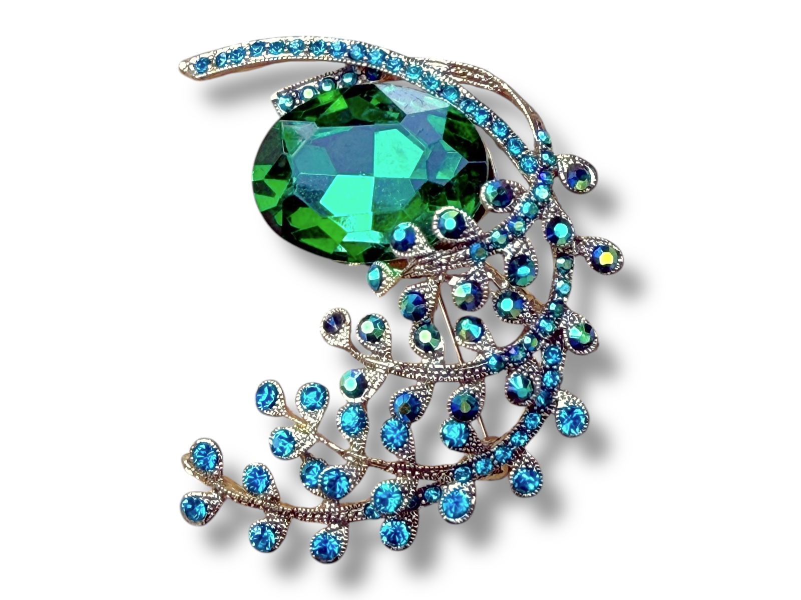 A Golden Metal Brooch With A Facetted Green Glass Flower And Leaves Inlaid With Small Facetted Turquoise Glass Beads.