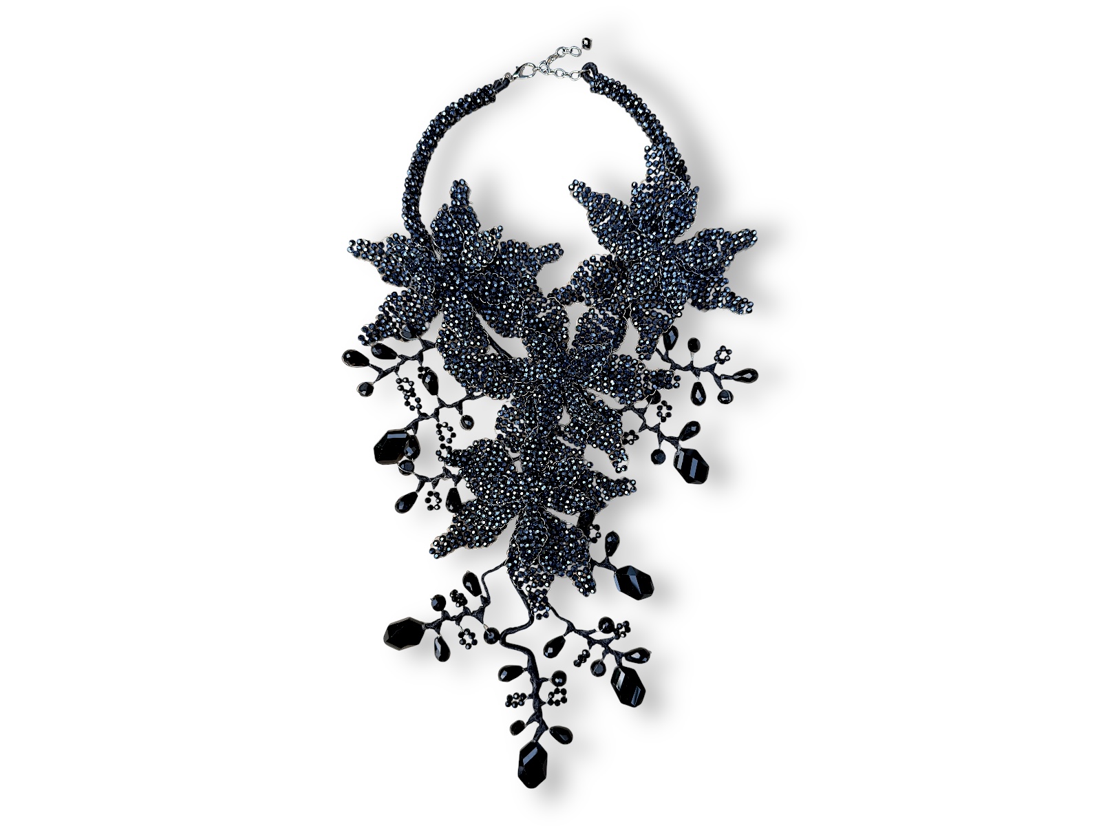 A Thai Large, Floral Patterned, Curved Bands Necklace And Pendant, Of Mixed Shaped And Sized, Black Facetted Glass Beads.