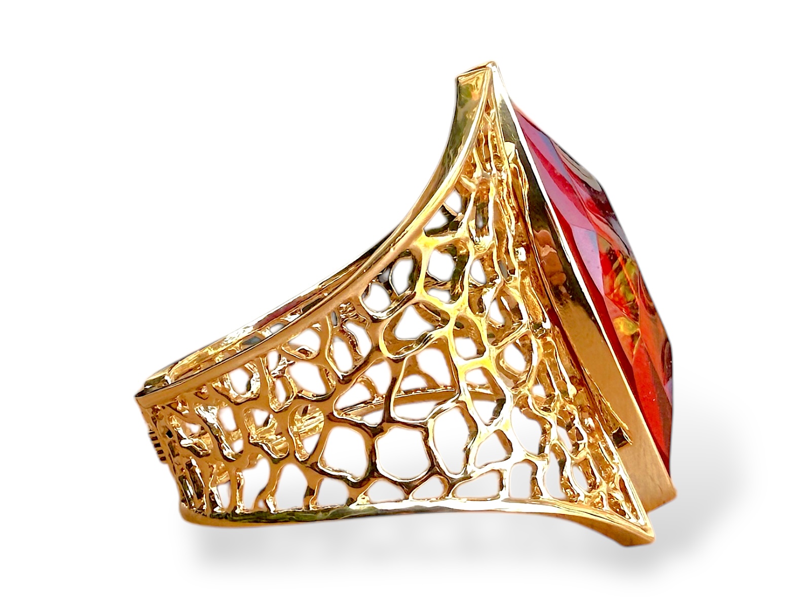 A Golden Metal Filigree Patterned Tapered Bands Hinged Bangle With A Red Facetted Glass Domed Pointed Oval Centre. - Image 3