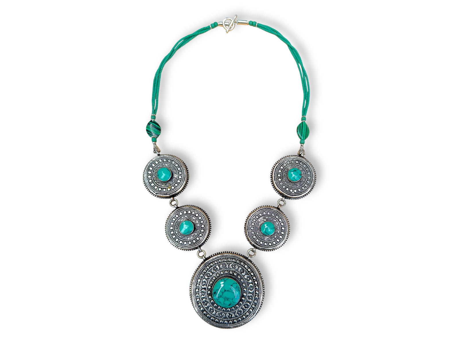An Afghan Long Necklace Of Green Glass Beads, And Silver Plated Patterned Discs, Each With A Turquoise Domed Circular Centre.