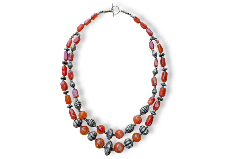 One Afghan Two Strand Necklace Of Cornelian Facetted Rectangular Beads And Round Beads, And Patterned Silver Plated Beads.