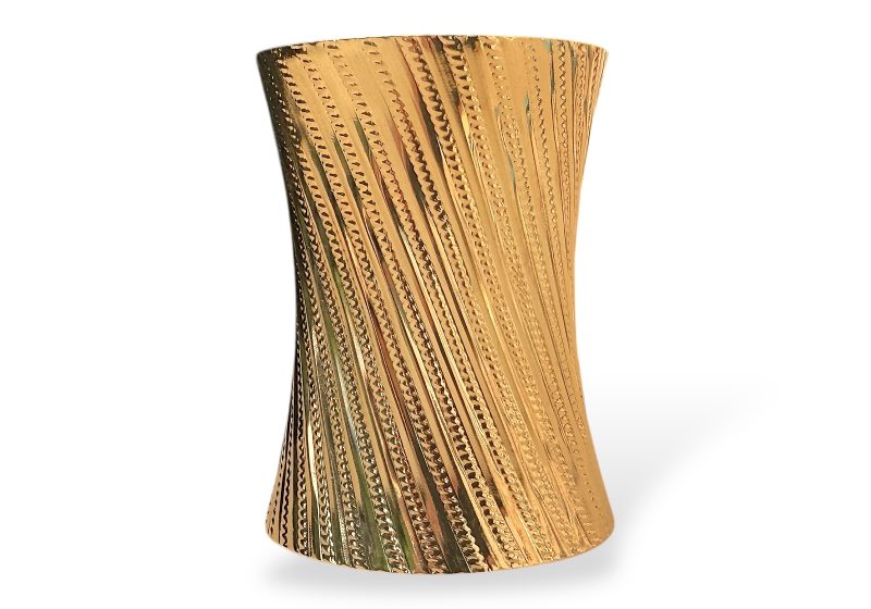A Golden Metal Long Open Cuff, Patterned With Diagonal Engraved Coiled Bands.
