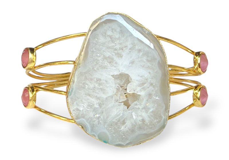 A Gold Plated Tapered Open Cuff With A Large White And Clear Rock Crystal Druzy Centre, And Four Small Pink Glass Cabochons.