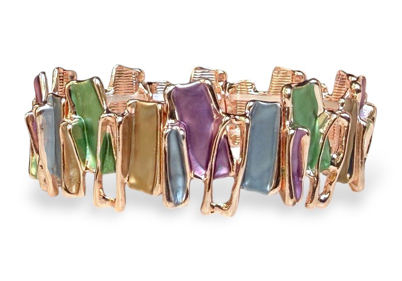 A Golden Metal Elasticated Bracelet With Multicoloured Enamelled Rectangular Panels.