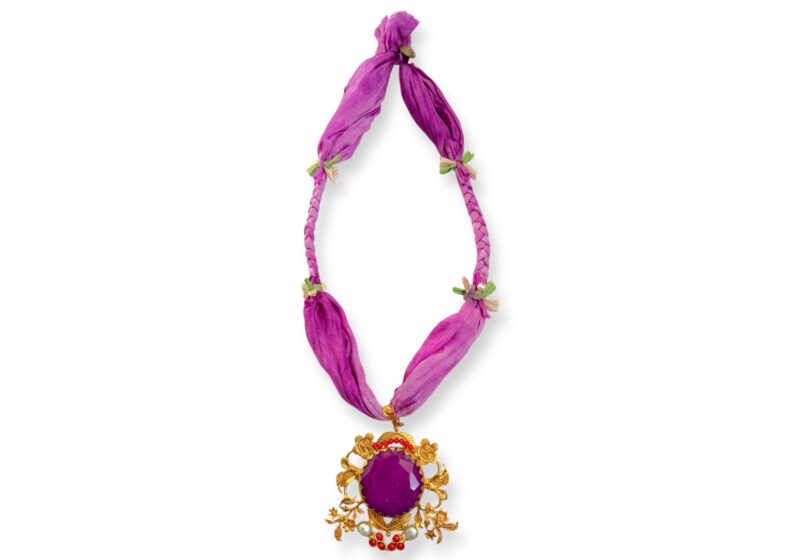 A Purple Silk Bands Long Necklace With A Gold Plated Circular Pendant, Inlaid With A Purple Dyed Agate Domed Circular Panel.