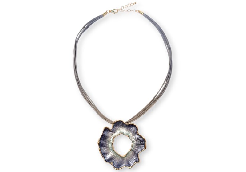 A Golden Metal, Light Blue To Dark Blue, Enamelled Band Flower Pendant, On A Four Band Grey Cords Long Necklace.