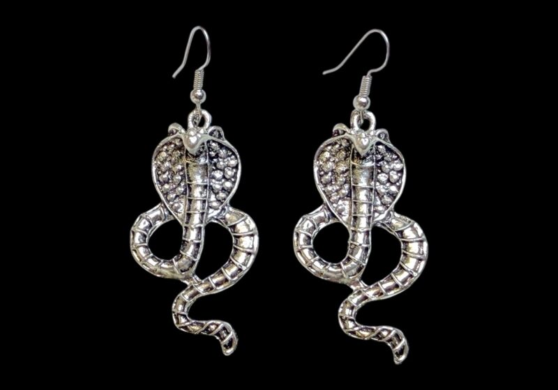 A Pair Of Silvered Metal Coiled Patterned Band Cobra Snake Earrings, Suspended From Silver Plated Wire Hooks.