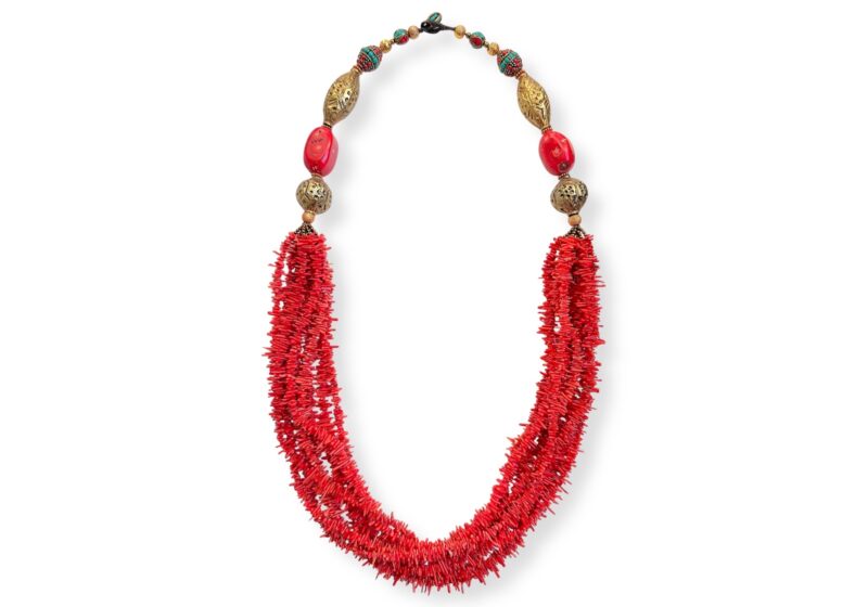 A Nepalese Long Necklace With Strands Of Red Coral Small Branches, Golden Metal Patterned Beads, And Multicoloured Beads.