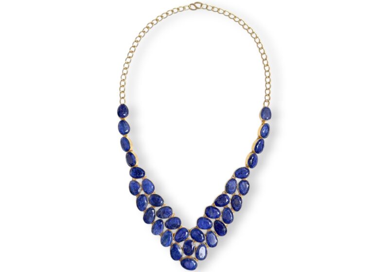A Gold Plated Chain Necklace With A Triangular Panel Of Linked Lapis Lazuli Facetted Oval  Beads, Each Set In A Gold Plated Frame. (Copy)