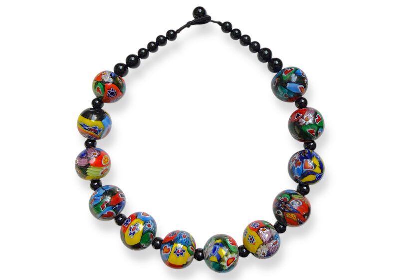 A Necklace Of Twelve Indian Large Round Millefiori Glass Beads With Black Onyx Round Spacers And Beads.