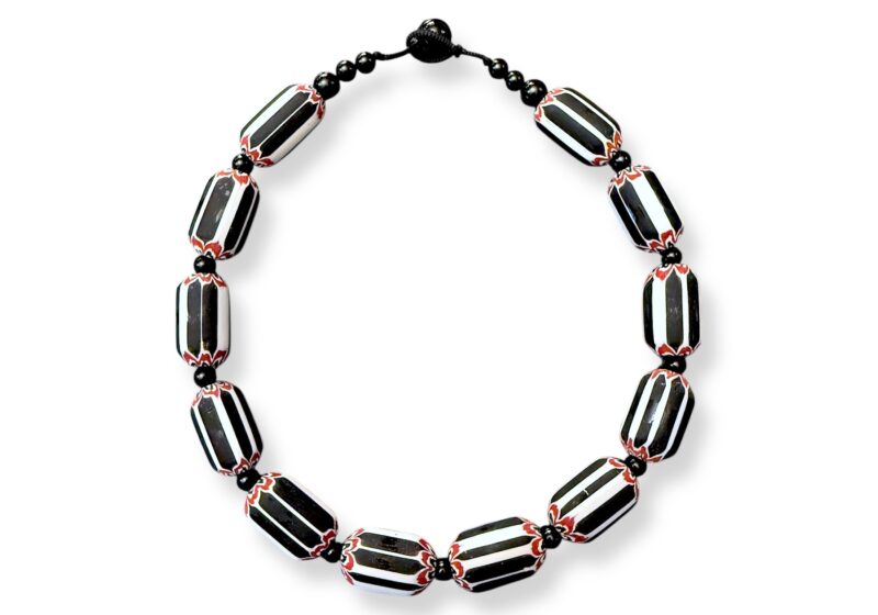 A Necklace Of Black, White, And Red Glass Striped Chevron Barrel Beads, And Small Black Onyx Round Beads And Spacers.