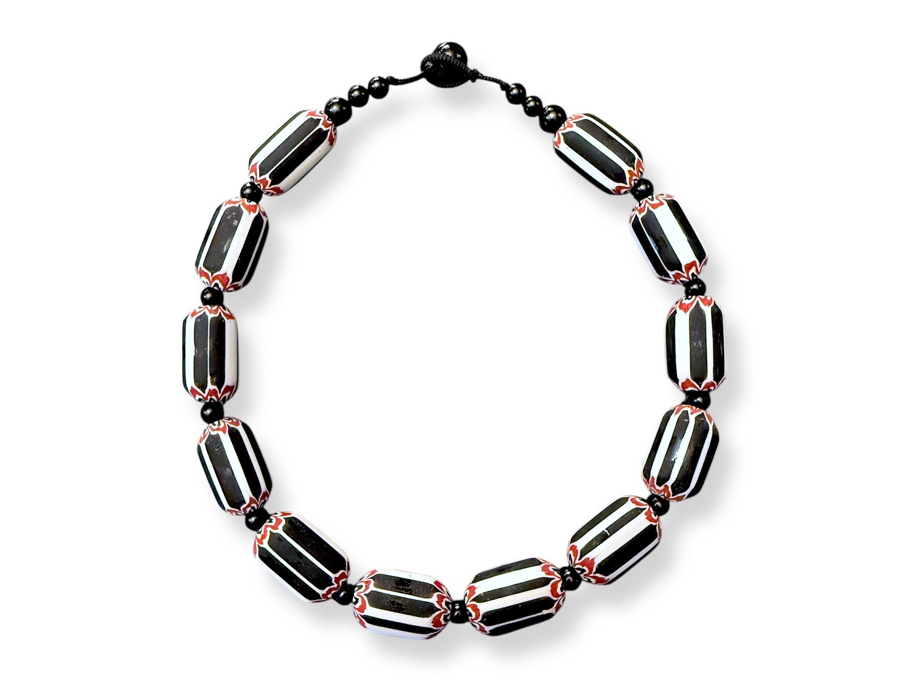 A Necklace Of Black, White, And Red Glass Striped Chevron Barrel Beads, And Small Black Onyx Round Beads And Spacers.