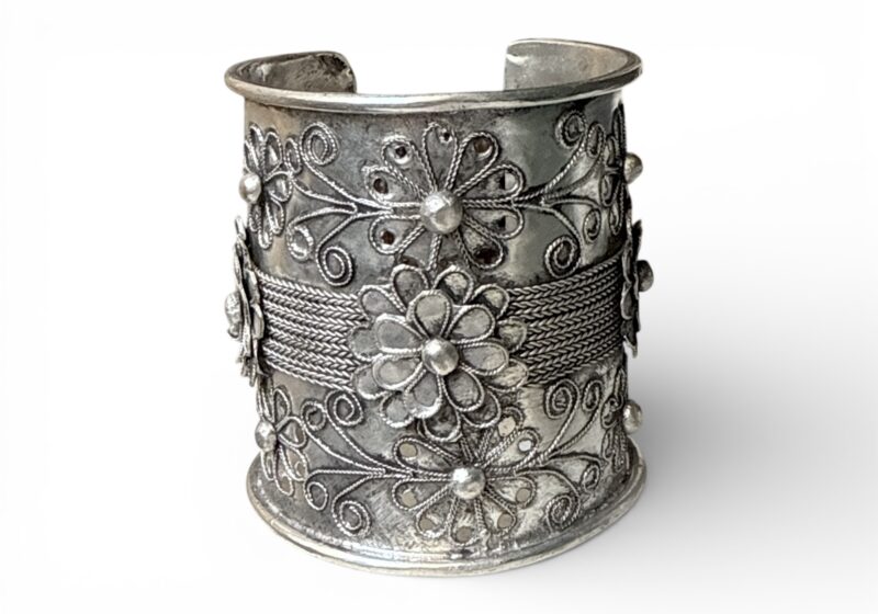 A Miao Silver Plated Open Cuff Patterned With Flowers And Leaves. China.