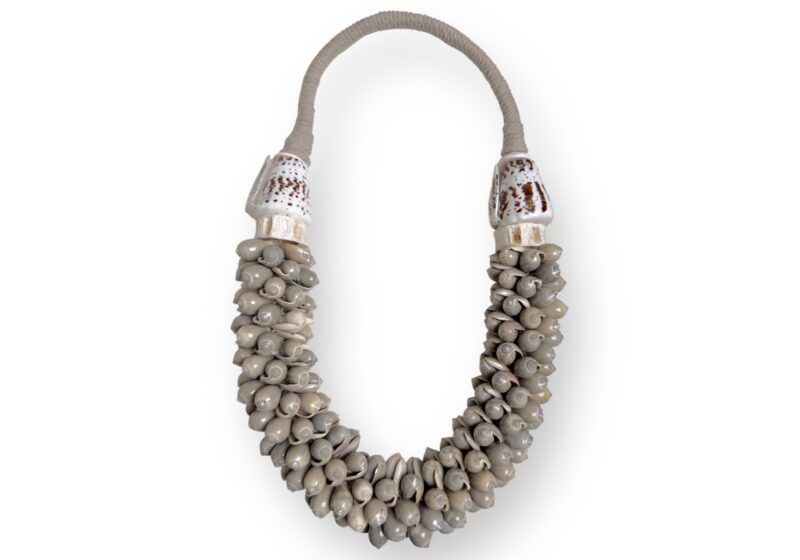 A New Guinea Long Necklace Of White Braided Rope, With Small Curled Grey Shells