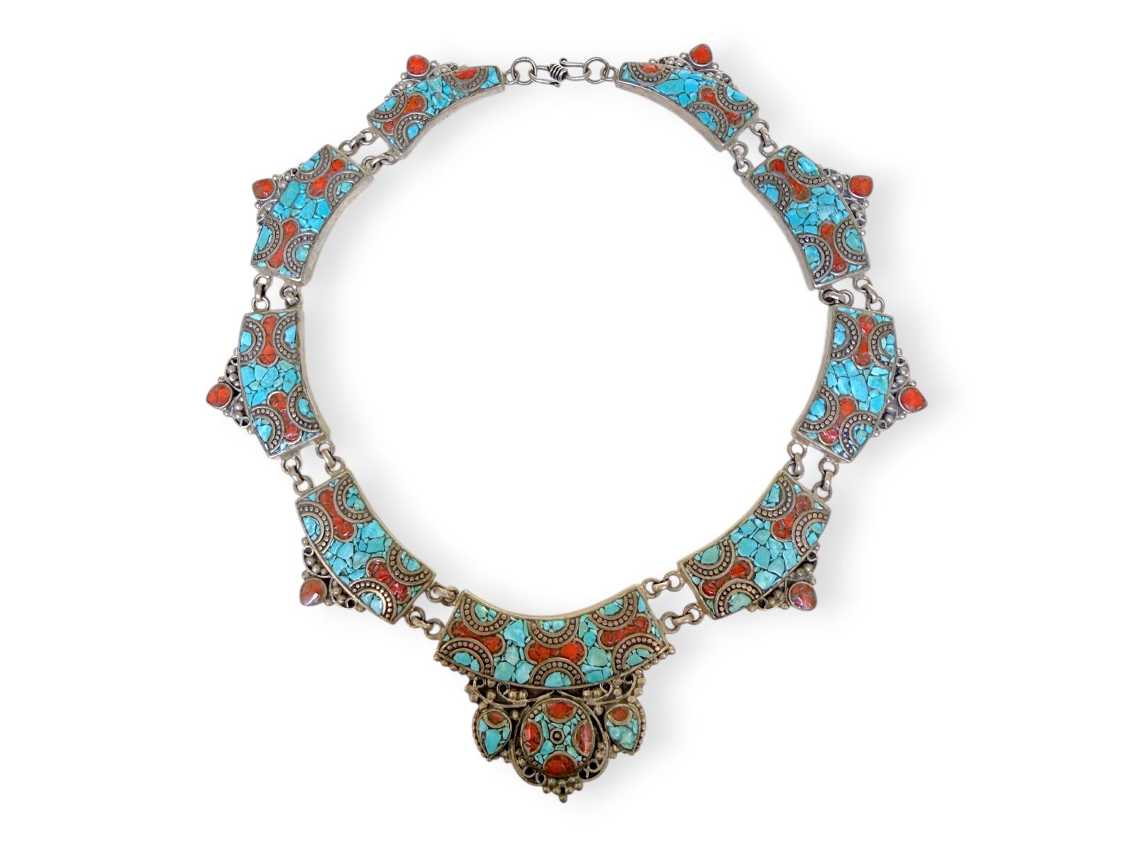 A Nepalese Silver Plated Curved Band Necklace, With Six Linked Curved Bands, Each With Turquoise And Red Glass Inlays.