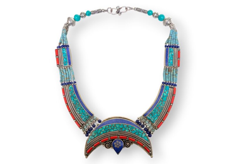 A Nepalese Silver Plated Necklace With A Crescent Shaped Pendant With Turquoise And Coral Beads, And Blue Resin Inlays.
