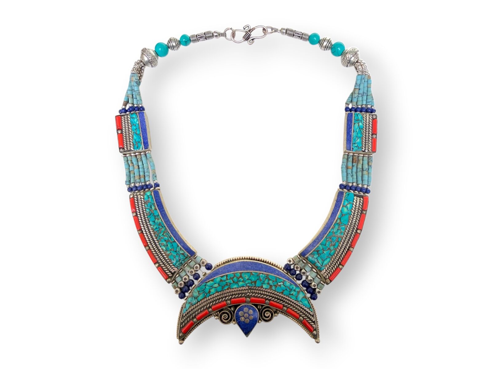 A Nepalese Silver Plated Necklace With A Crescent Shaped Pendant With Turquoise And Coral Beads, And Blue Resin Inlays.