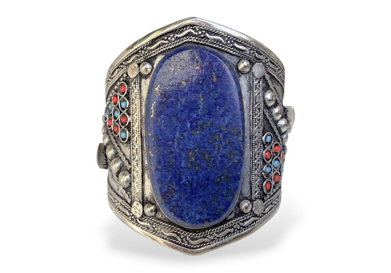 An Afghan Silver Plated Open Cuff, Inlaid With A Lapis Oval Cabochon With Red And Blue Small Glass Beads.