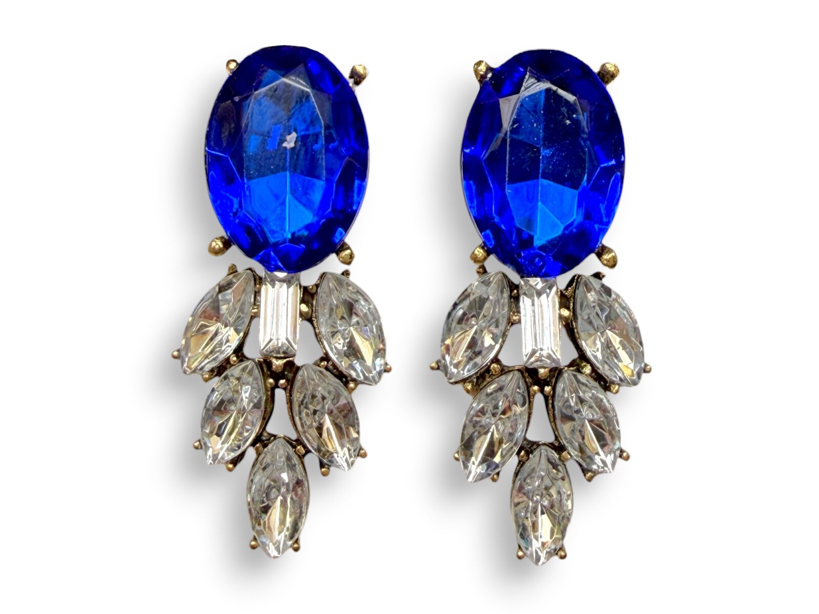 A Pair Of Golden Metal Earrings With Blue And Clear Facetted Resin Cabochons.