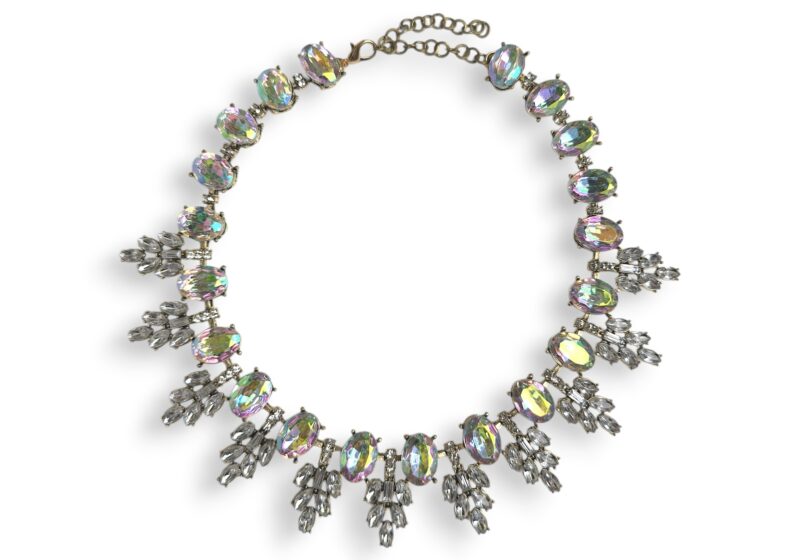 A Golden Metal Necklace With Iridescent And Clear Facetted Resin Cabochons.