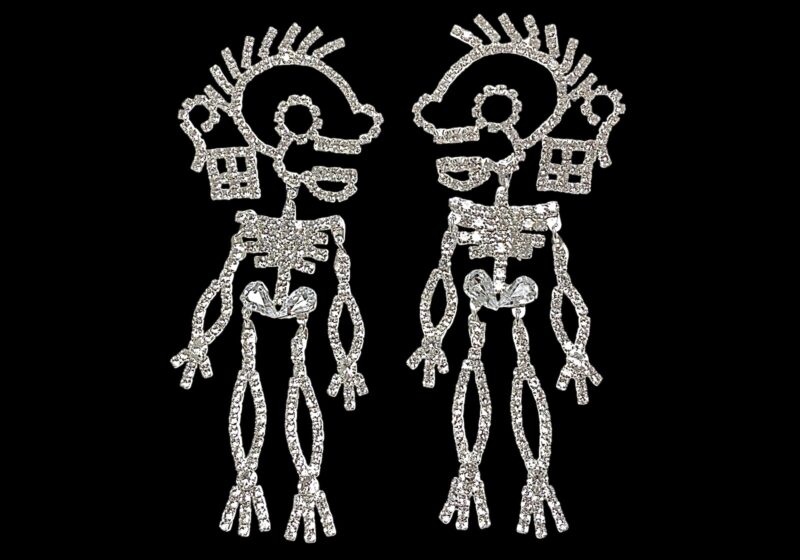A Pair Of Silvered Metal Skeleton Earrings Inlaid With Small Clear Facetted Resin Cabochons