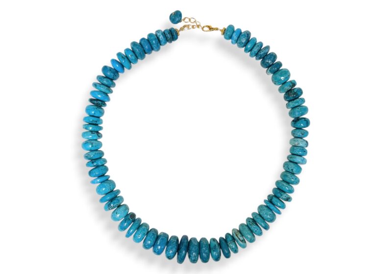 A Necklace Of Sixty-Five Graduated Turquoise Blue Dyed Howlite Button Beads.