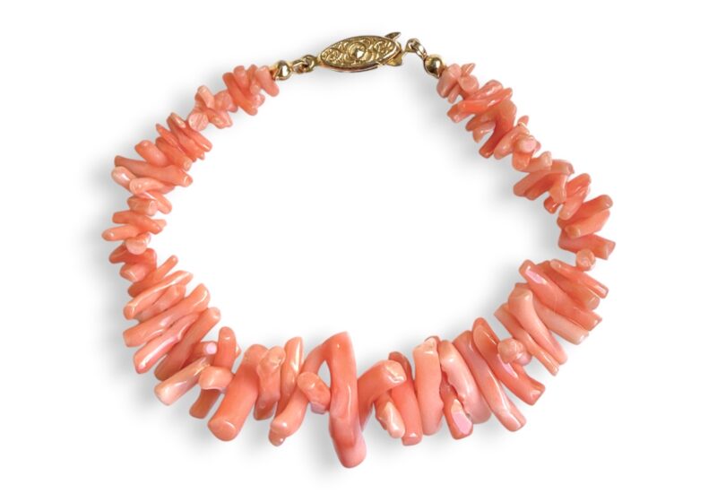 A Bracelet Of Italian Frangia Coral Small, Graduated Length Orange Branches.